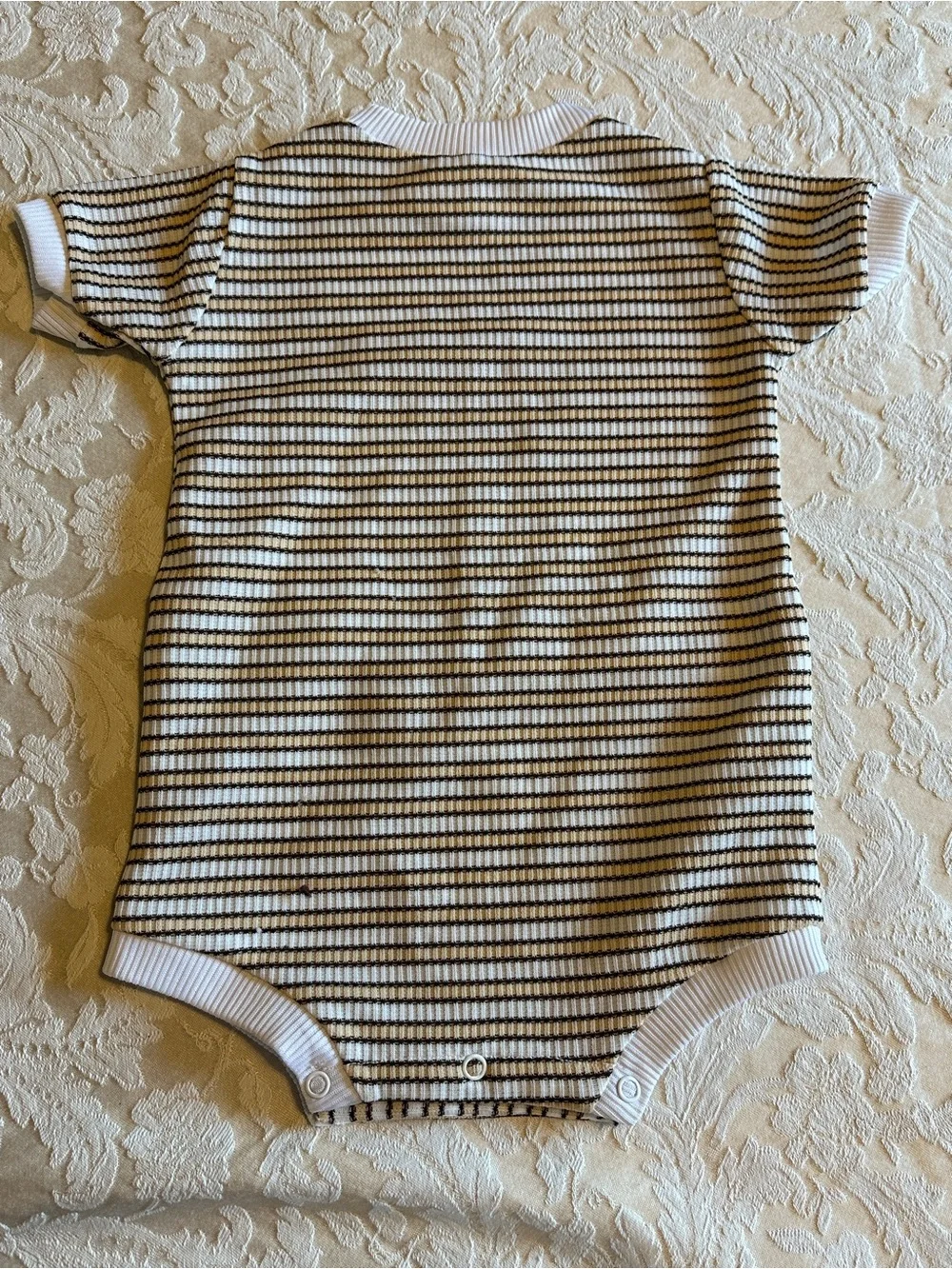 Striped Short-Sleeve Baby One-Piece in White and Black with Button Detail